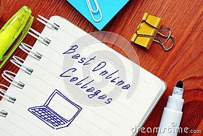 Educational concept about Best Online Colleges with sign on the piece of paper Stock Photo