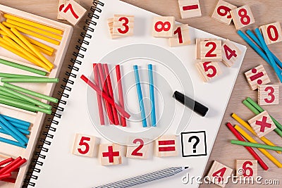 Educational kids math toy wooden board stick game counting set in kids math class kindergarten. Stock Photo