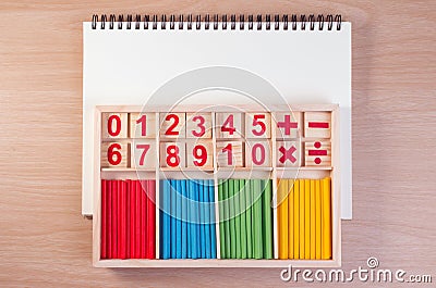 Educational kids math toy wooden board stick game counting set in kids math class kindergarten. Stock Photo