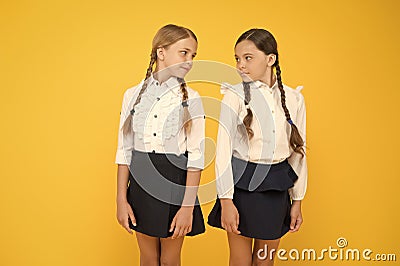 Educational program for gifted kids. Best pupils award. Making everything right. Excellent pupils. Girls perfect uniform Stock Photo
