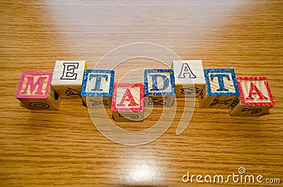 Educational toy cubes with letters organised to display word metadata - keywording and Search engine optimisation Stock Photo