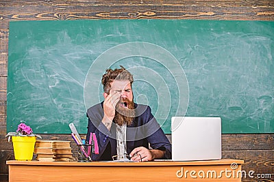 Educator bearded man yawning face tired at work. Educators more stressed at work than average people. Exhausting work in Stock Photo