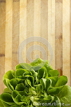 EDZR - Crop of fresh lettuce on a wood table Stock Photo