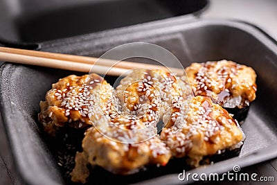 Eel Sushi rolls in box. selective focus. packaged sushi. Traditional japan food Stock Photo