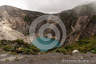 Eerie scenery of the crater of the Irazu active volcano in Costa Rica Stock Photo