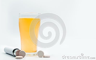 Effervescent tablets tube with blank label and orange flavored Stock Photo