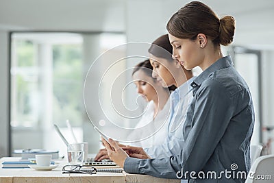 Efficient business women working together Stock Photo