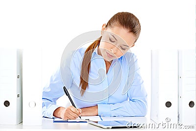 Efficient businesswoman working at her desk Stock Photo