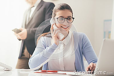 Efficient secretary on the phone Stock Photo