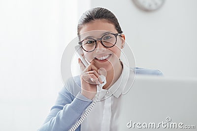 Efficient secretary on the phone Stock Photo