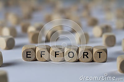 Effort - cube with letters, sign with wooden cubes Stock Photo