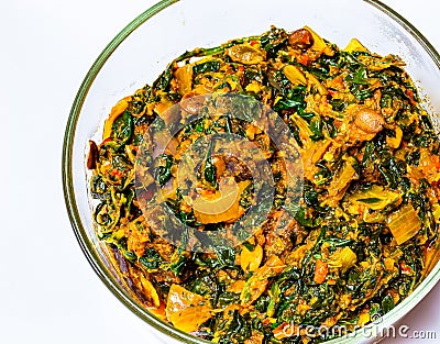 Macrophotography, close up of Efo riro shared in a dish Stock Photo