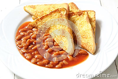 Egg bread toast and baked bean in tomato sauce Stock Photo