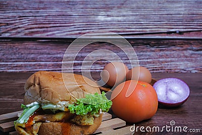 Egg burger , tomato, onion and eggs Stock Photo