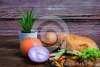 Egg burger , tomato, onion and eggs Stock Photo