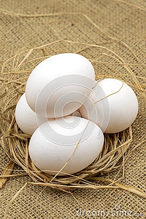 Egg carton on jute fabric. close-up white egg. Story format Stock Photo