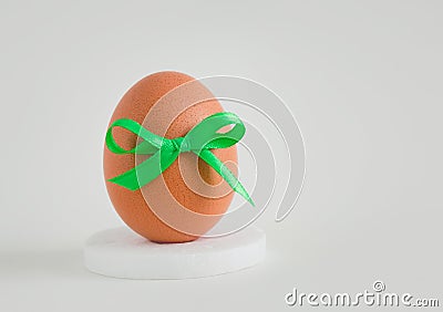 Egg with a decor on a white background. Stock Photo