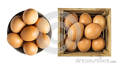 Egg isolated on white background. Boiled egg in eggcup and eggs on wooden box isolated on white. Close-up of an egg isolated on wh Stock Photo