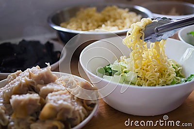 Egg noodle with big dumpling pork Stock Photo