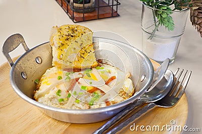 Egg pan with pork and bread for breakfast, tradition Thai style Stock Photo