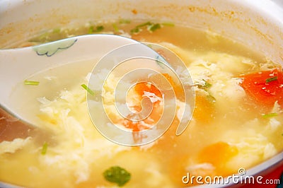 Egg soup with tomatoes Stock Photo