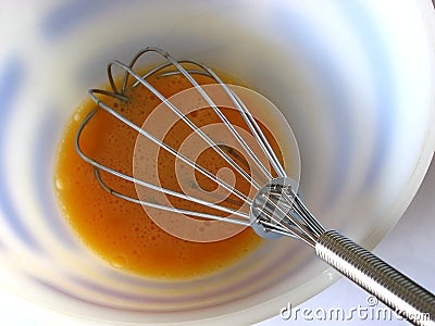 Egg and whisk Stock Photo