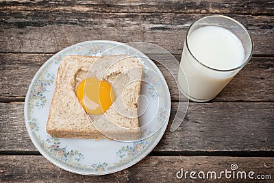 Egg with whole grain bread wooden background Stock Photo