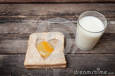 Egg with whole grain bread wooden background Stock Photo