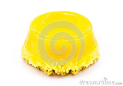 Egg yolk candy, called Quindim in Brazil, and Portugal in brisa-do-Lis. isolated white background Stock Photo