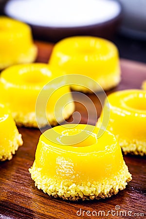 Egg yolk candy with sugar, typical of Brazil and Portugal, called Quindim or Brisa de Liz Stock Photo