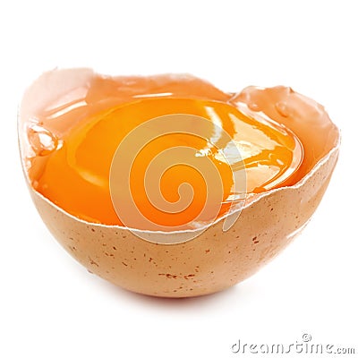 Egg Yolk in Shell over White Stock Photo