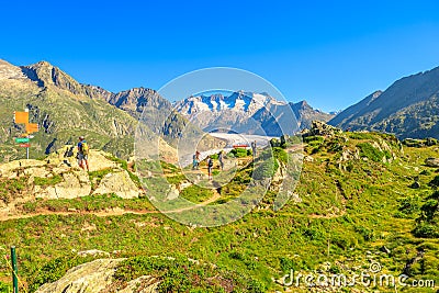 Tourists trekking at Alpine Glacier Editorial Stock Photo