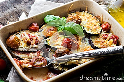 Eggplant,zucchini and tomato with mozzarella Stock Photo