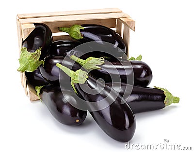 Eggplants (Solanum melongena) in wooden crate Stock Photo