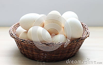 Eggs in a basket Stock Photo