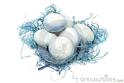 Eggs in blue nest Stock Photo
