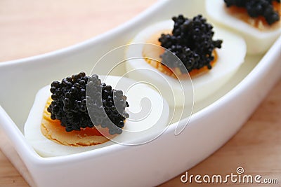 Eggs with caviar Stock Photo