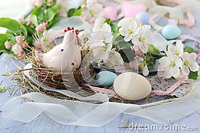 Eggs, Easter decoration, apple tree flowers on a wooden surface Stock Photo