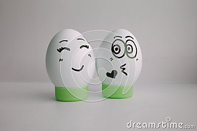 Eggs are funny with a face Concept: a kiss Stock Photo