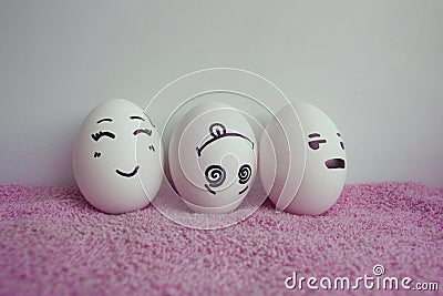 Eggs funny with faces concept of discontent Stock Photo