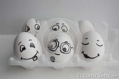 Eggs are funny with faces. Show the language Stock Photo