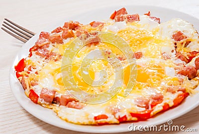 Eggs with ham and cheese Stock Photo