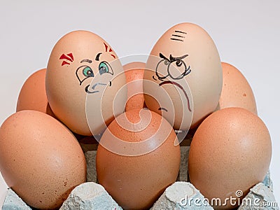 Eggs with painted faces. Photo for your design. Concept of joint Stock Photo