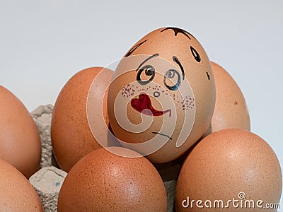 Eggs with painted faces. Photo for your design. Concept of joint Stock Photo