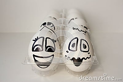 Eggs with painted faces. Photo for your design Stock Photo