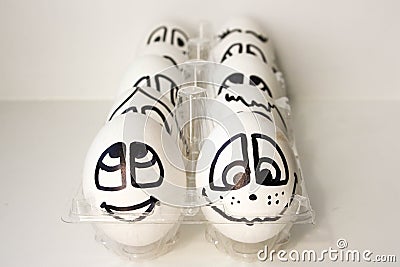 Eggs with painted faces. Photo for your design Stock Photo