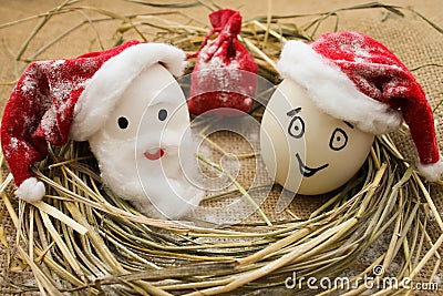 Eggs with persons in the nest for Christmas Stock Photo