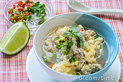 Eggs, pork soup Stock Photo