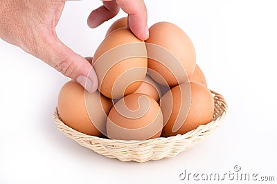 Eggs in rattan basket a healthy food gift on white backgrounds Stock Photo