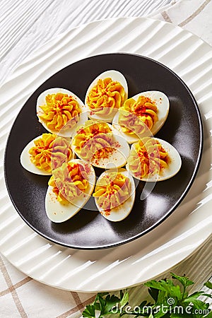 Eggs stuffed with yolks, dijon mustard, mayonnaise Stock Photo